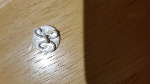 Emerald and 'H' charm process