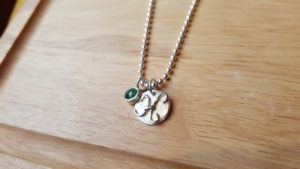 Emerald and 'H' charm