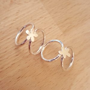 Bespoke handmade silver splint ring with flower design