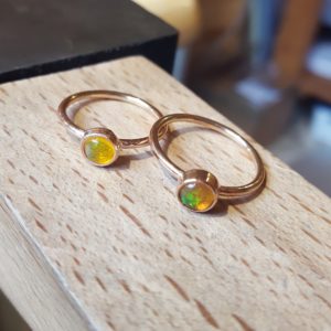 Rose gold and opal rings