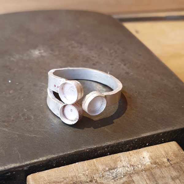The making of a three tourmaline stone ring