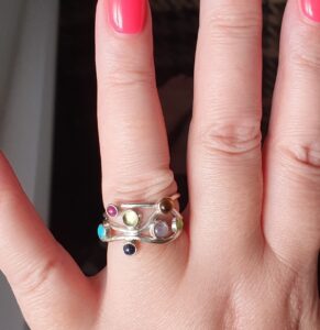 Gemstone ring on client