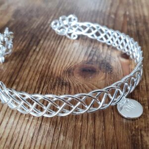 Celtic cuff bangle with initial charm