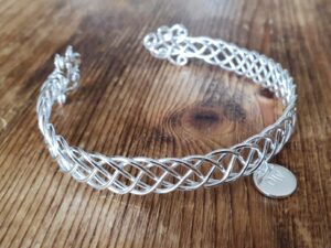 Celtic cuff bangle with initial charm