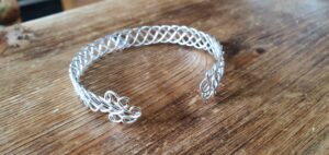 Celtic cuff bangle with initial charm