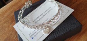 Celtic cuff bangle with initial charm