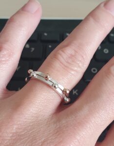 Sterling silver and rose gold studded rings