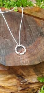 Battle pendant with ball detail