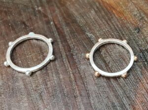 Sterling silver and rose gold studded rings