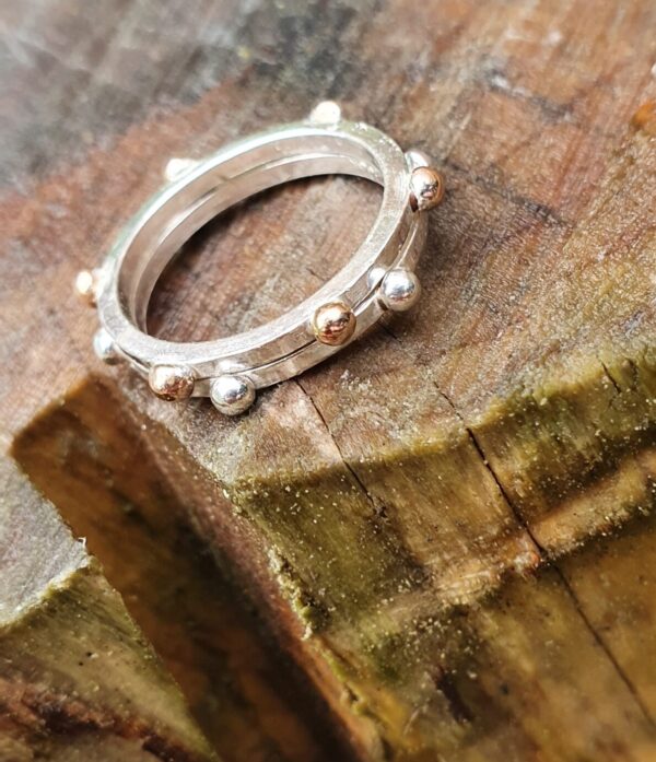 Sterling silver and rose gold studded rings