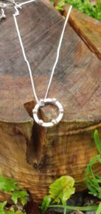 Battle pendant with ball detail