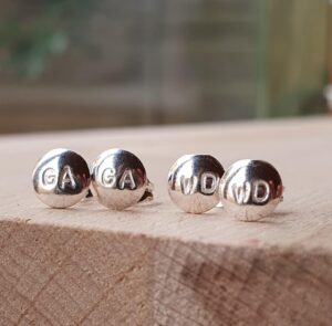 Netball earrings with netball positions