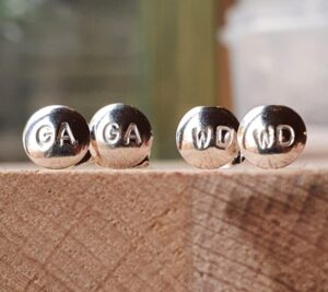 Netball earrings with netball positions