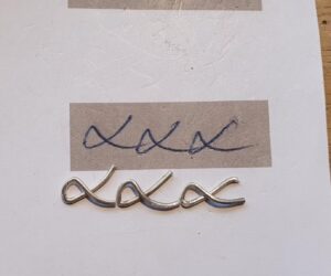 Personalised silver Kisses necklace