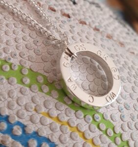 Spinning netball pendant.