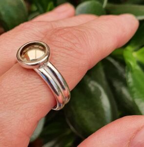 Silver and gold gem ring