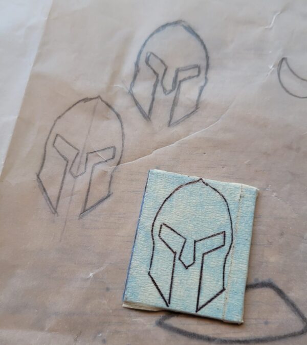 The making of the sterling silver Spartan helmet pin badge