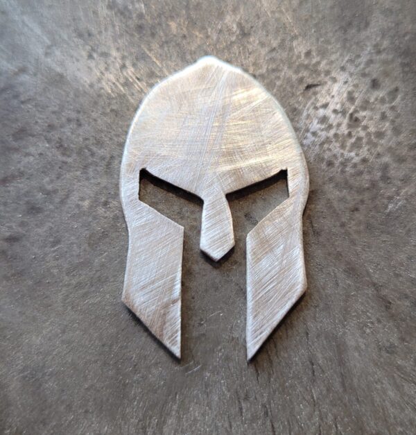 The making of the sterling silver Spartan helmet pin badge