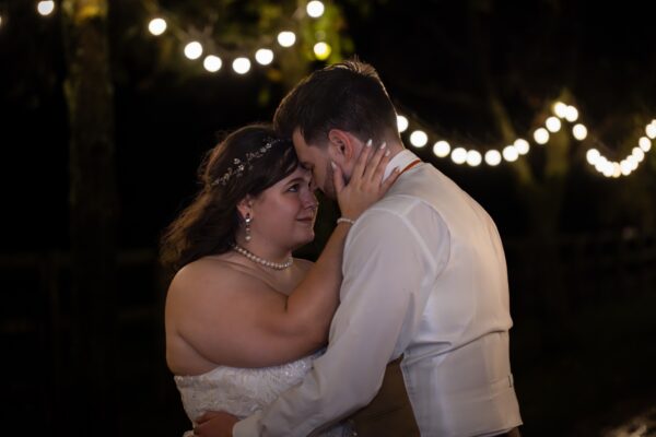The beautiful bride on her wedding day wearing the pearl earrings.