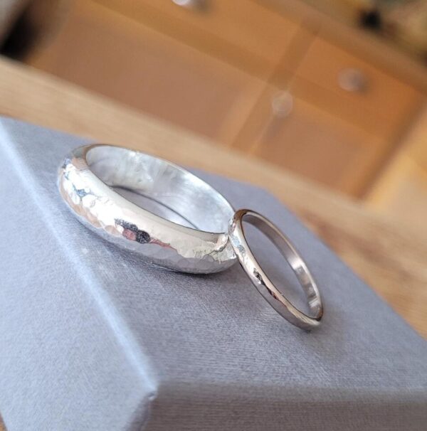 Silver wedding rings made at a wedding ring workshop.