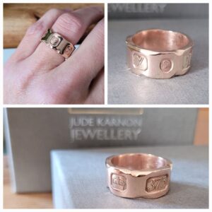 Hallmarked rose gold ring with chiselled marble effect.