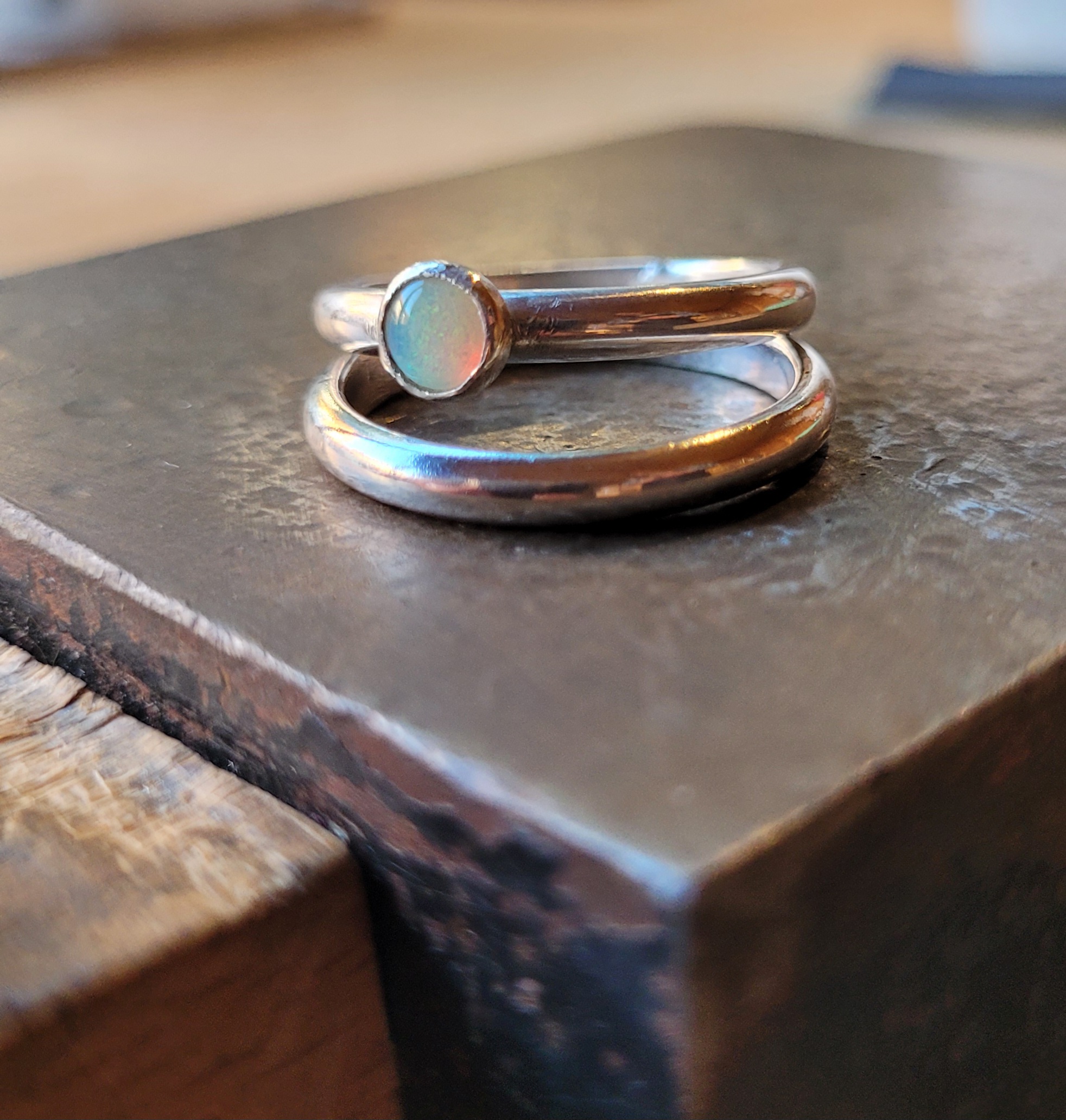 Ethiopian opal set in silver band with matching plan band. Made in my gem setting workshop.