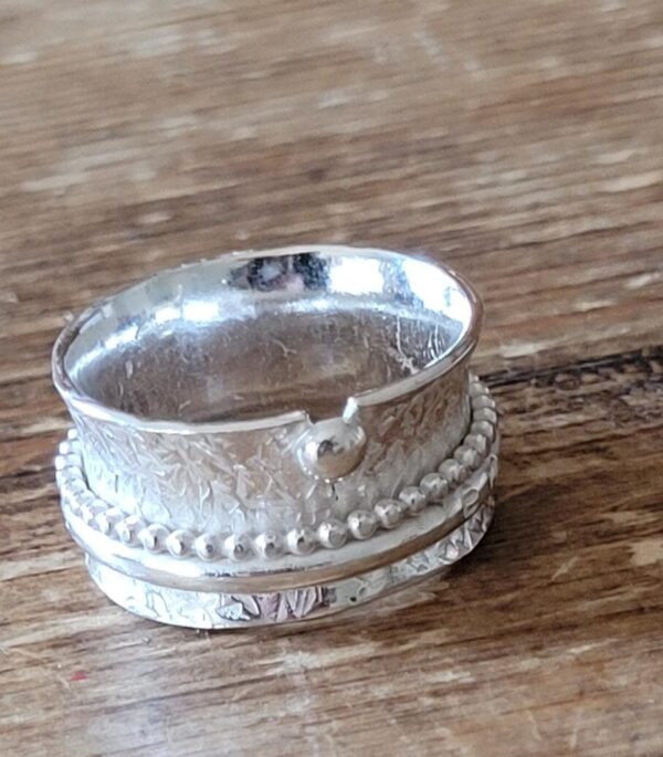 Silver spinner ring made at my workshop.