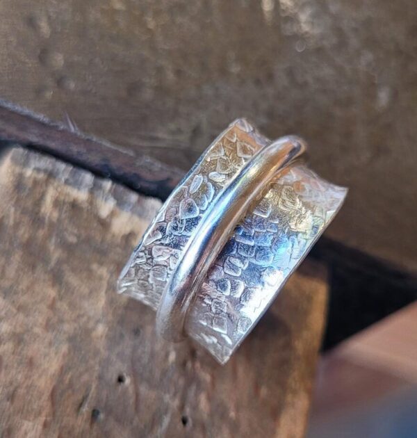 Silver spinner ring made at my workshop.
