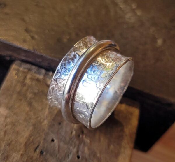 Silver spinner ring made at my workshop.