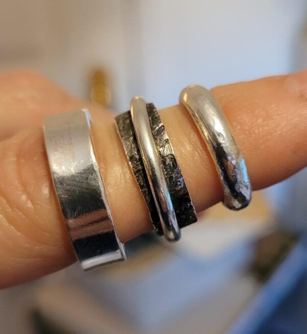 Silver wedding rings made at a wedding ring workshop.