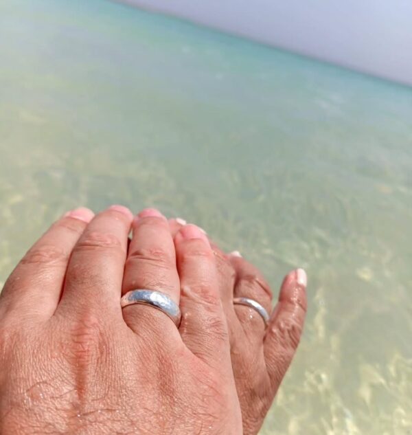 Wedding rings on their honeymoon!